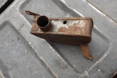 Triumph Rigid hole in frame air filter box